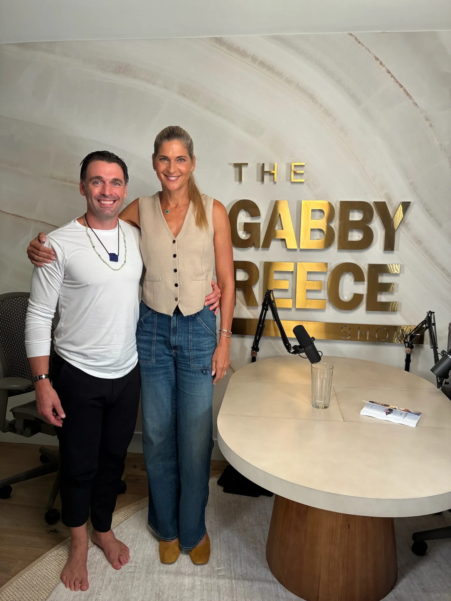 Dominic Luke and Gabby Reece smiling at The Gabby Reece Show